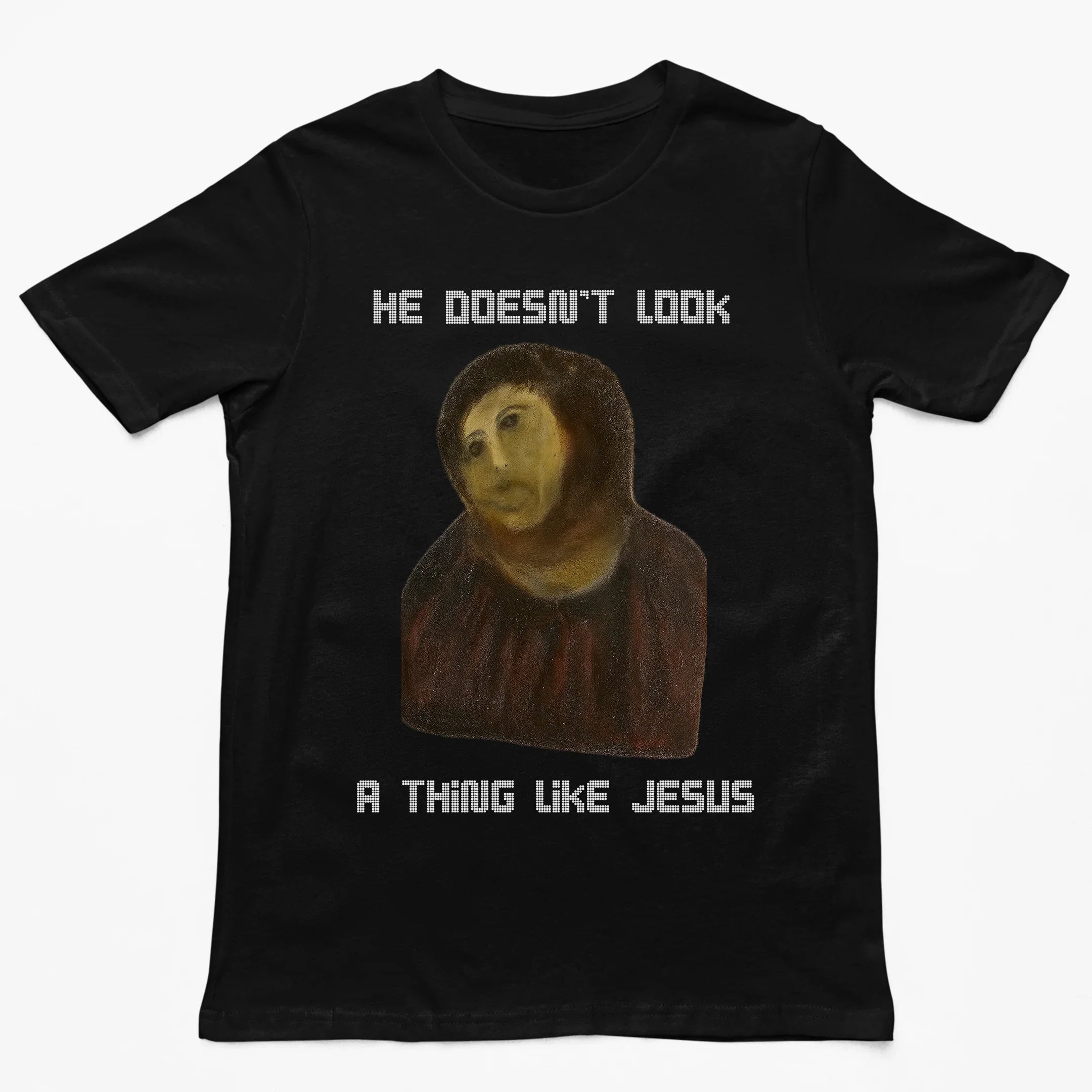 He doesn't look a thing like Jesus T-Shirt - Orbital Clothing