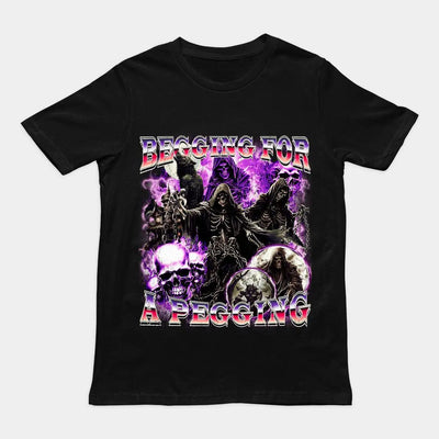 Bold "Begging for a Pegging" sarcastic text graphic on a black premium heavy cotton t-shirt.