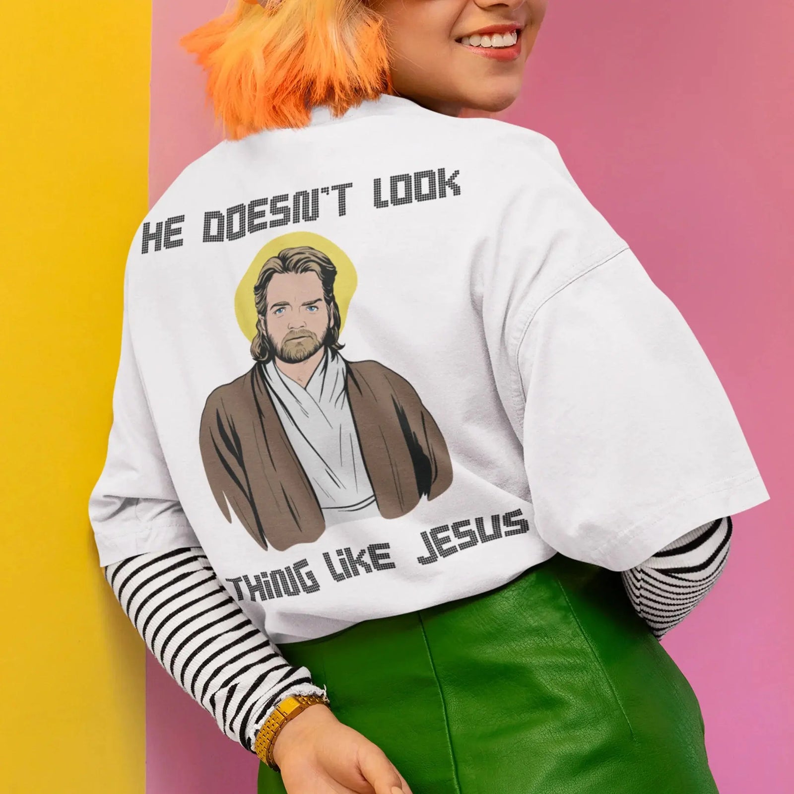 He doesn't look a thing like Jesus T-Shirt (backprint) - Orbital Clothing