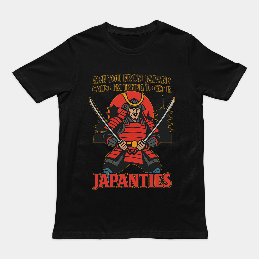 Humorous "Are you from Japan? Cause I'm trying to get in Japanties" pick-up line graphic on a black premium t-shirt.