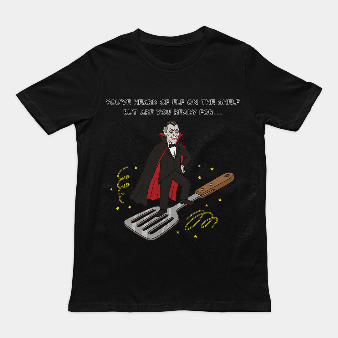 You've heard of elf on the shelf but are you ready for Dracula on a Spatula T-Shirt (backprint)