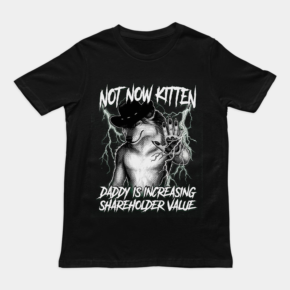 Funny "Not Now Kitten Daddy is Increasing Shareholder Value" sarcastic text printed on a black graphic t-shirt.