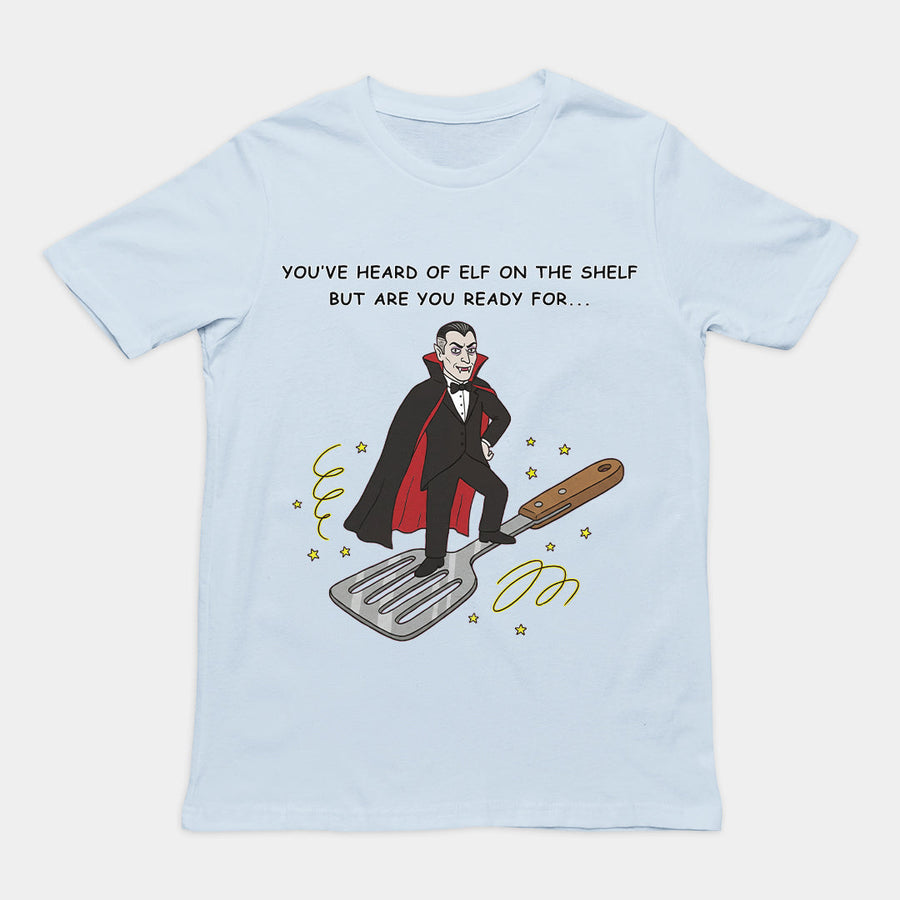 You've heard of elf on the shelf but are you ready for Dracula on a Spatula T-Shirt (backprint) Orbital Clothing