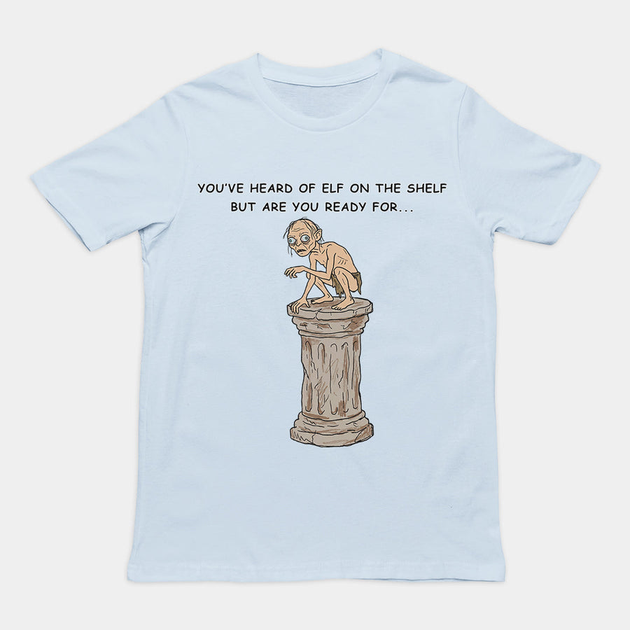 You've heard of elf on the shelf but are you ready for Gollum on a Collumn T-Shirt Orbital Clothing