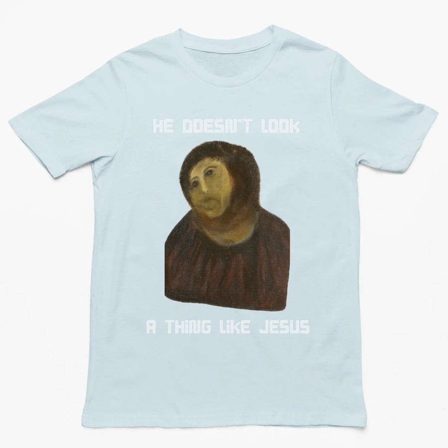 He doesn't look a thing like Jesus T-Shirt - Orbital Clothing