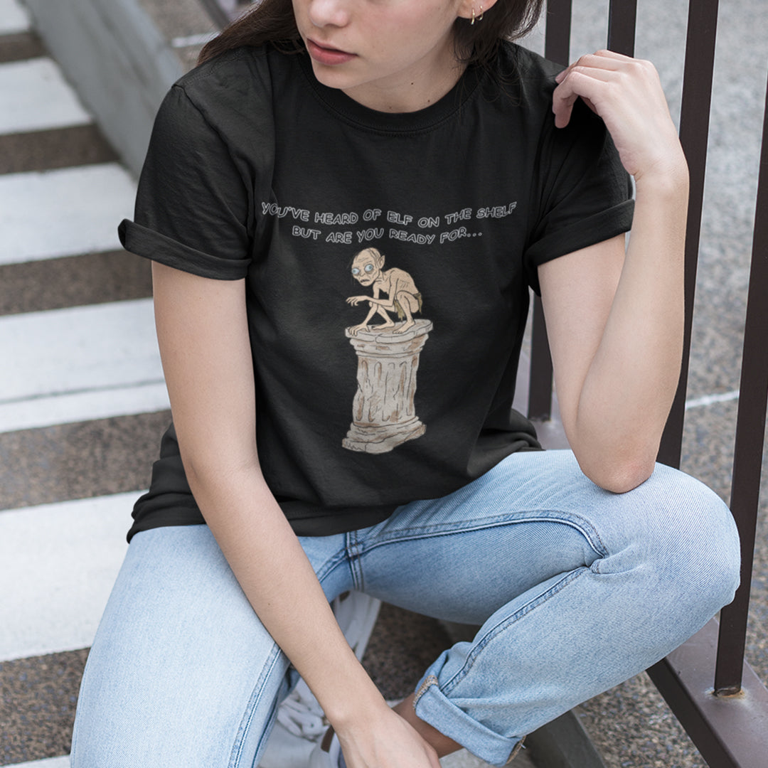You've heard of elf on the shelf but are you ready for Gollum on a Collumn T-Shirt Orbital Clothing
