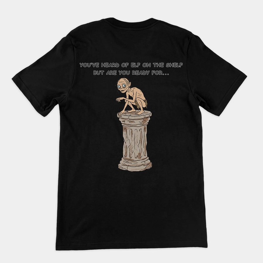 You've heard of elf on the shelf but are you ready for Gollum on a Collumn T-Shirt (backprint) Orbital Clothing