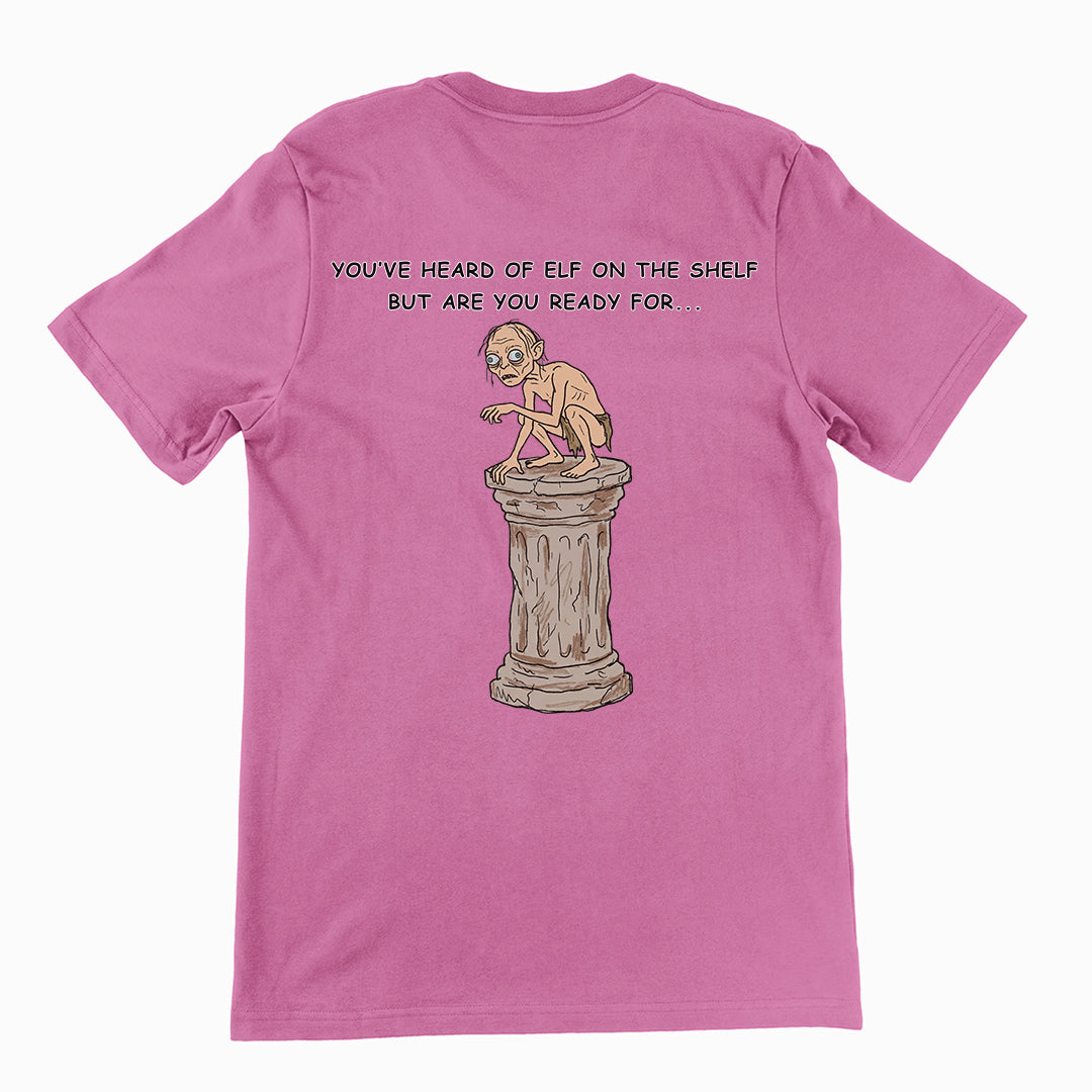 You've heard of elf on the shelf but are you ready for Gollum on a Collumn T-Shirt (backprint) Orbital Clothing