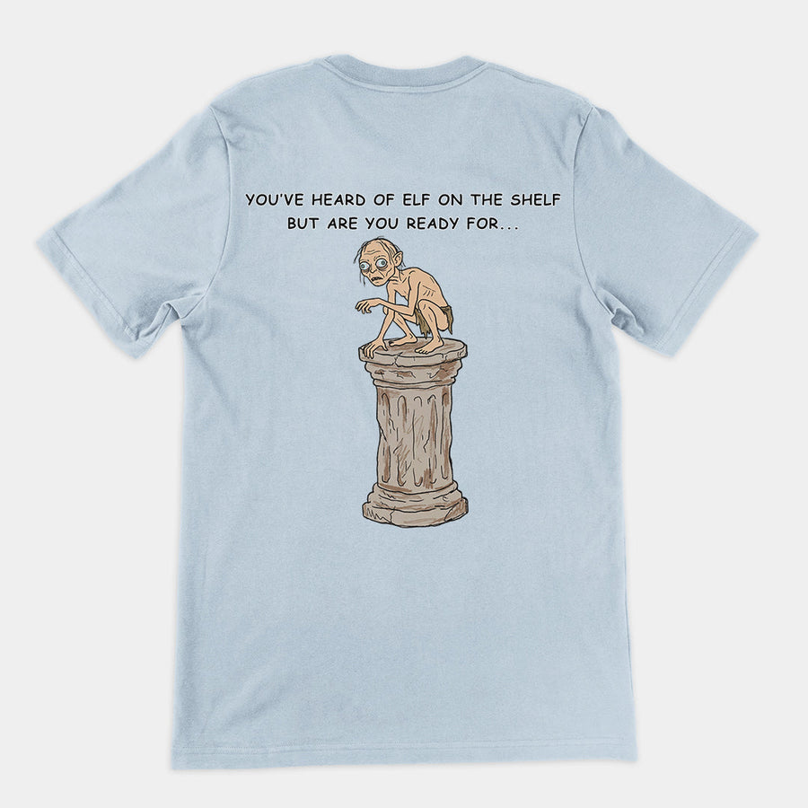 You've heard of elf on the shelf but are you ready for Gollum on a Collumn T-Shirt (backprint) Orbital Clothing