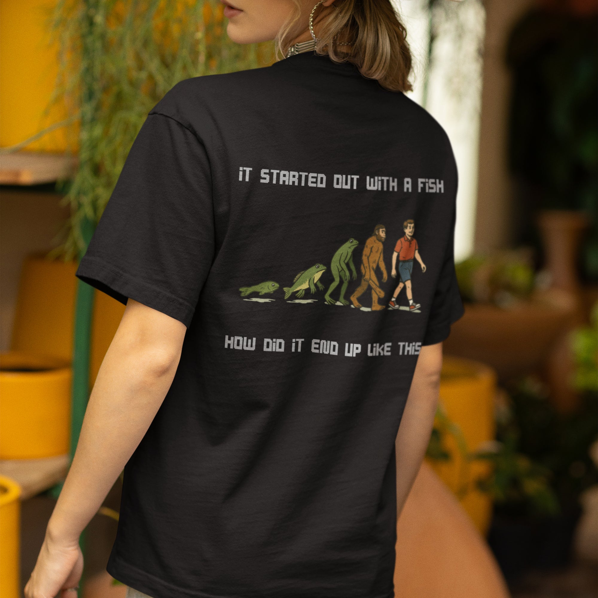 It started out with a fish How did it end up like this T-Shirt (backprint)