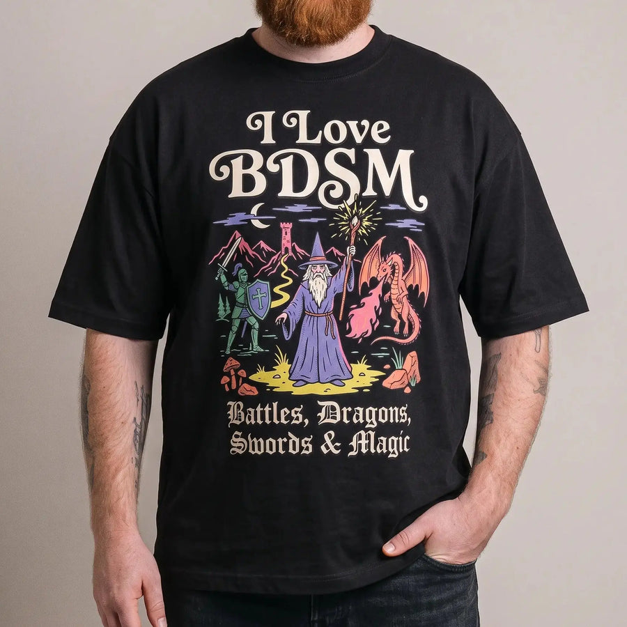 Model wearing the I Love BDSM (Battles, Dragons, Swords & Magic) T-Shirt in black, studio photo