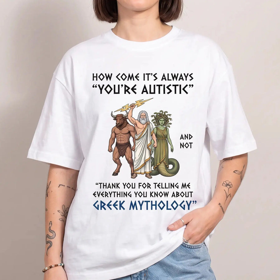 Model wearing the How come it's always you're autistic Greek Mythology T-Shirt in white, studio photo