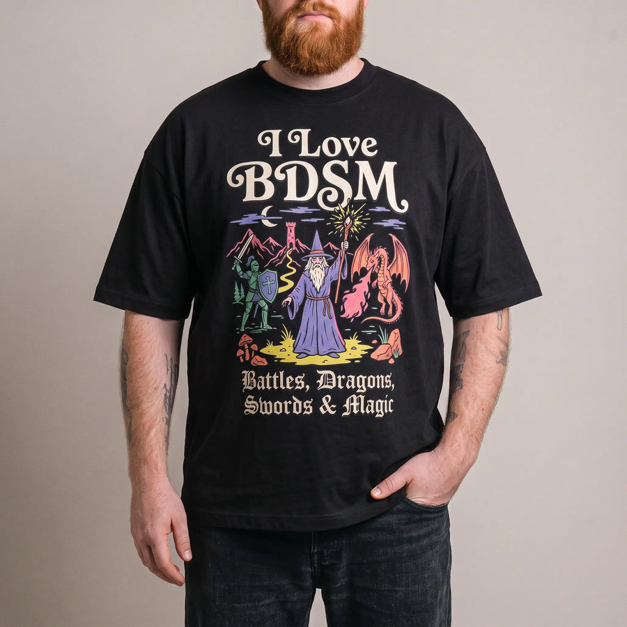 Model wearing the I Love BDSM (Battles, Dragons, Swords & Magic) T-Shirt in black, studio photo