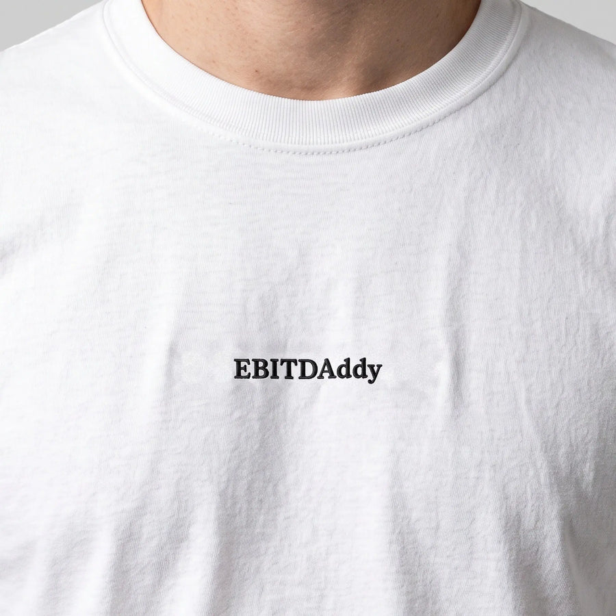 EBITDAddy embroidered t-shirt in white, worn, close-up of the stitching
