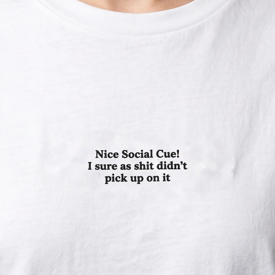 Nice Social Cue embroidered t-shirt in white, worn, close-up of the stitching