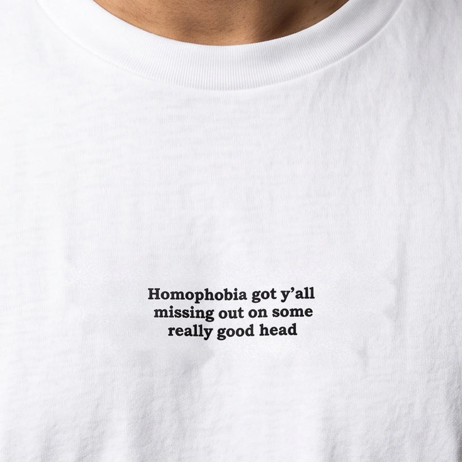 Homophobia got y'all missing out on some really good head embroidered t-shirt, worn, close-up of the stitching