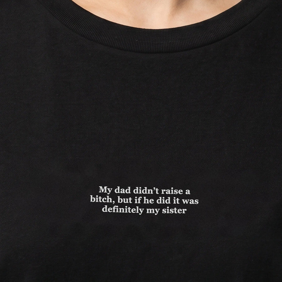 My dad didn't raise a bitch but if he did it was definitely my sister embroidered t-shirt, worn, close-up of the stitching