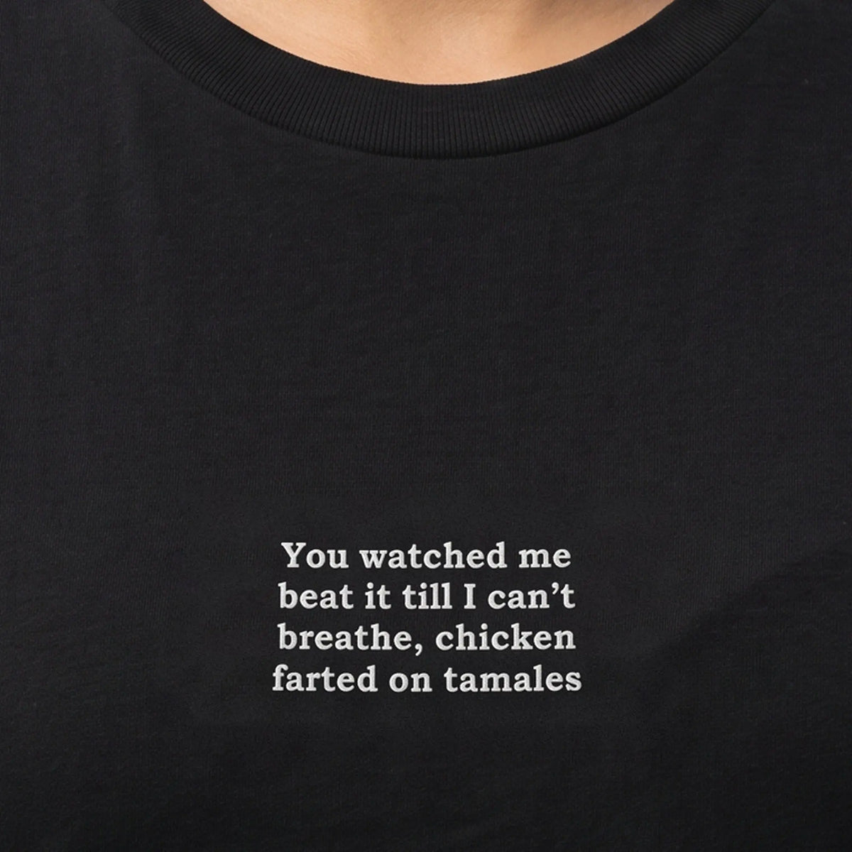 You watched me beat it till I can't breathe chicken farted on tamales embroidered t-shirt, worn, close-up of the stitching