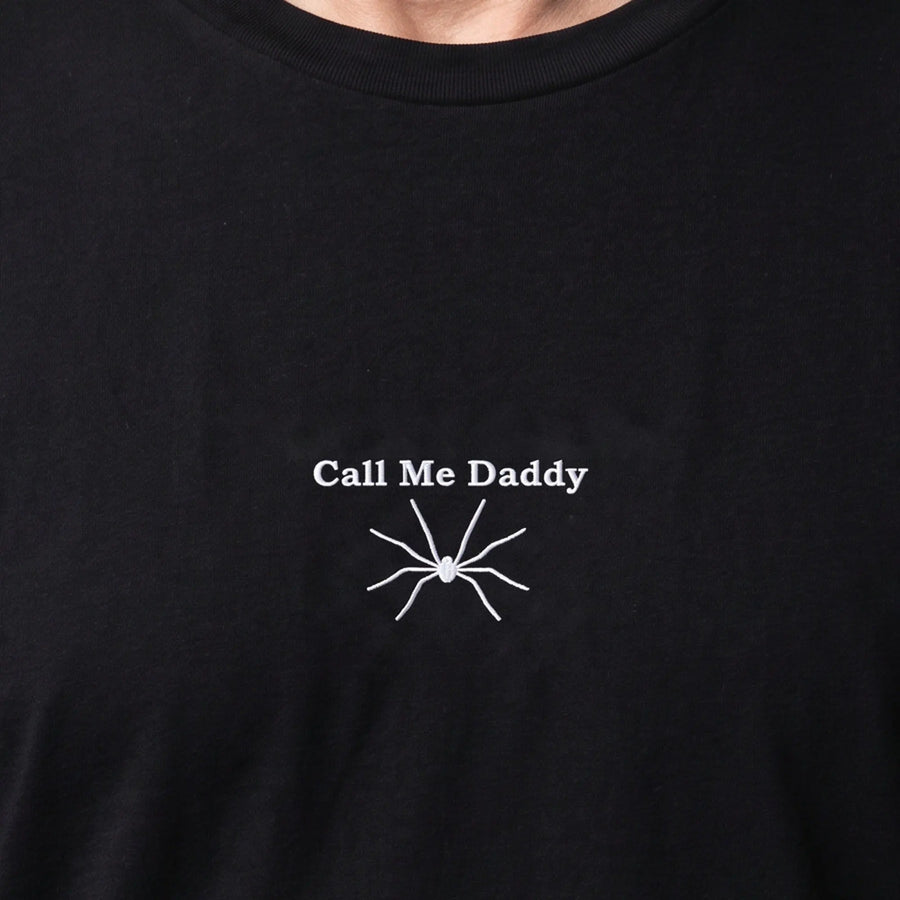 Call me Daddy (Embroidered) T-Shirt in Black, worn, close-up of the stitching