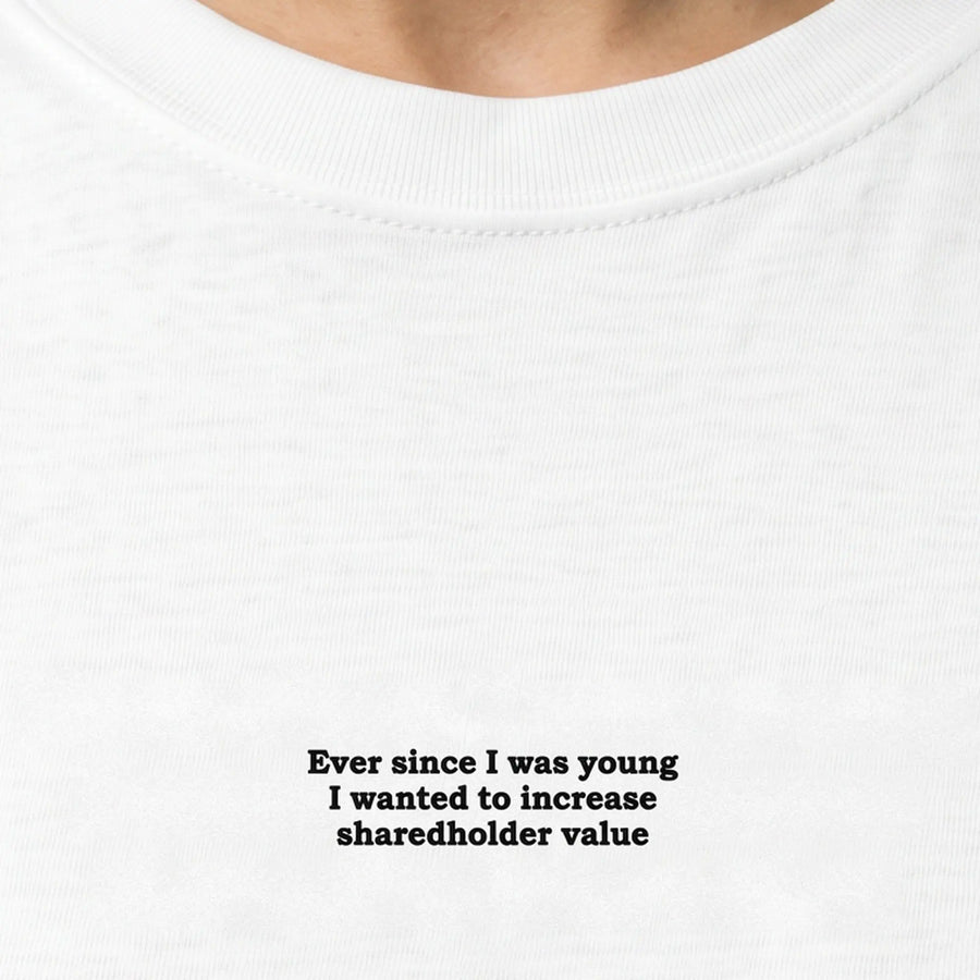 Ever since I was young I wanted to increase shareholder value embroidered t-shirt, worn, close-up of the stitching