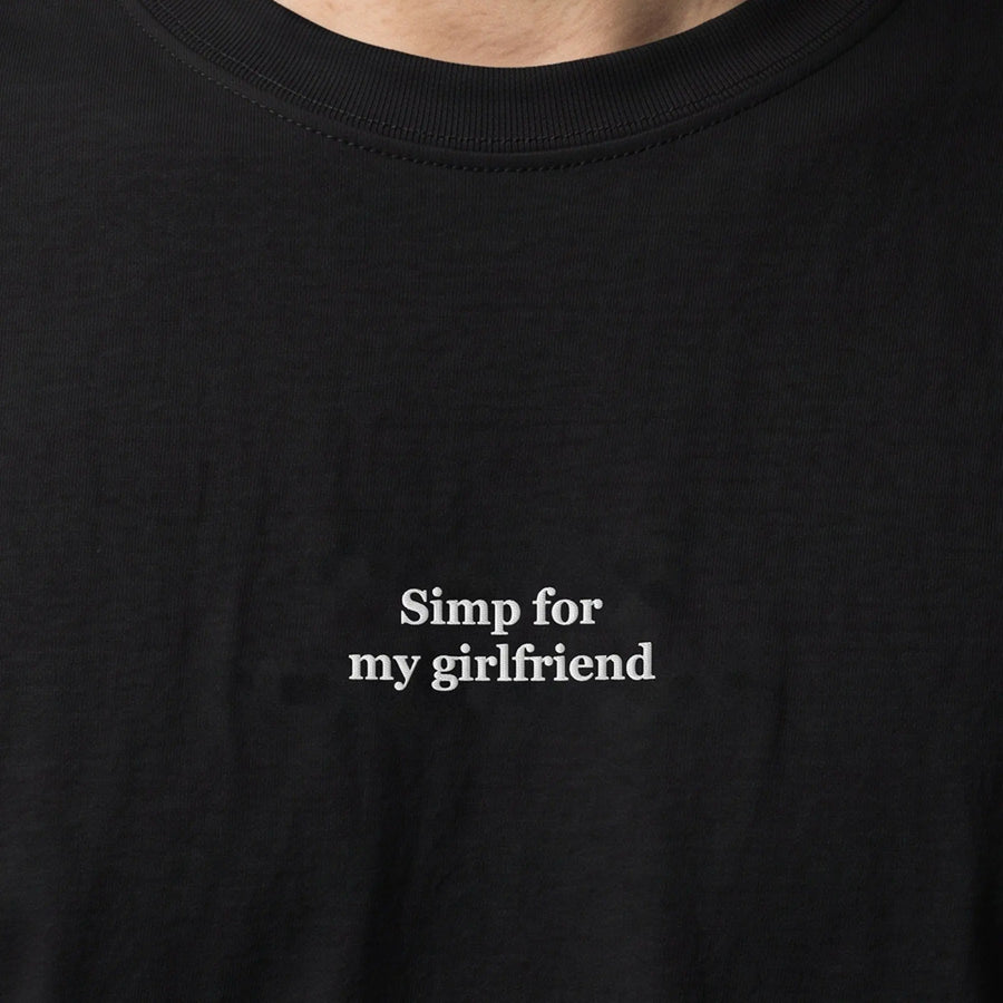 Simp for my girlfriend (embroidered) T-Shirt in black, worn, close-up of the stitching