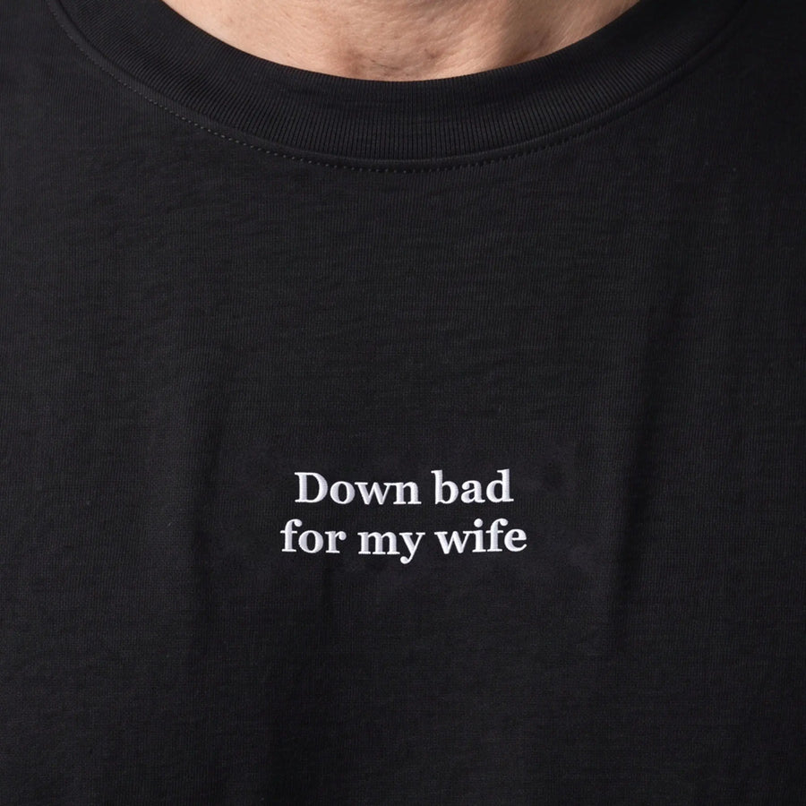 Down bad for my wife (embroidered) T-Shirt in Black, worn, close-up of the stitching