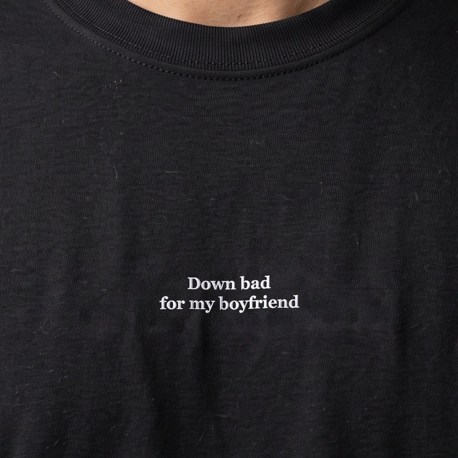 Down bad for my boyfriend (embroidered) T-Shirt in Black, worn, close-up of the stitching