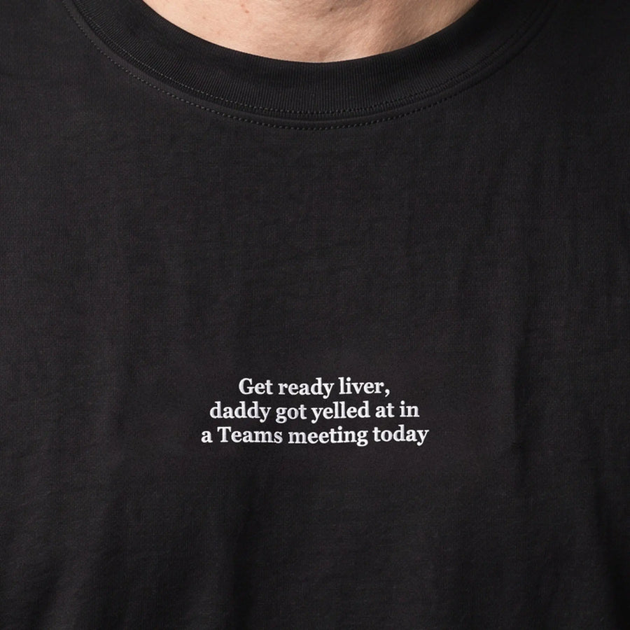 Get ready liver, daddy got yelled at in a Teams meeting today (embroidered) T-Shirt in Black, worn, close-up of the stitching