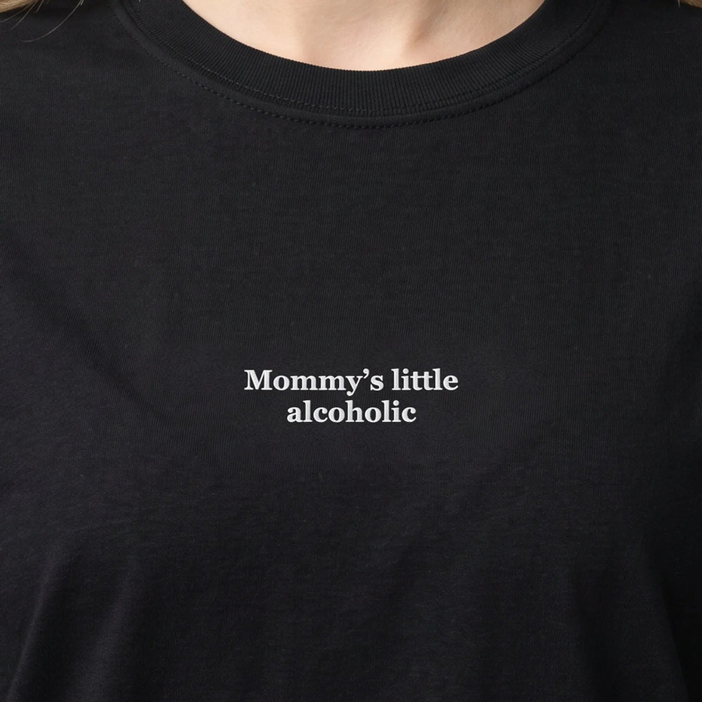 Mommy's little alcoholic (embroidered) T-Shirt in Black, worn, close-up of the stitching