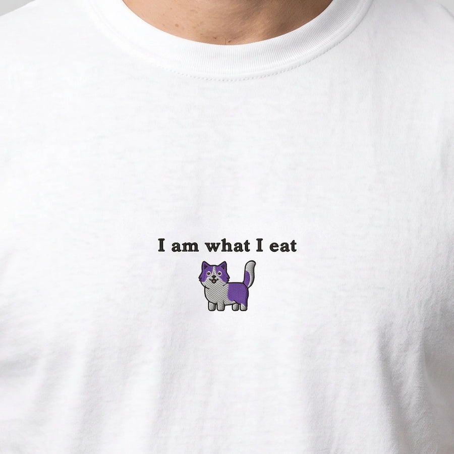I am what I eat (embroidered) T-Shirt in White, worn, close-up of the stitching
