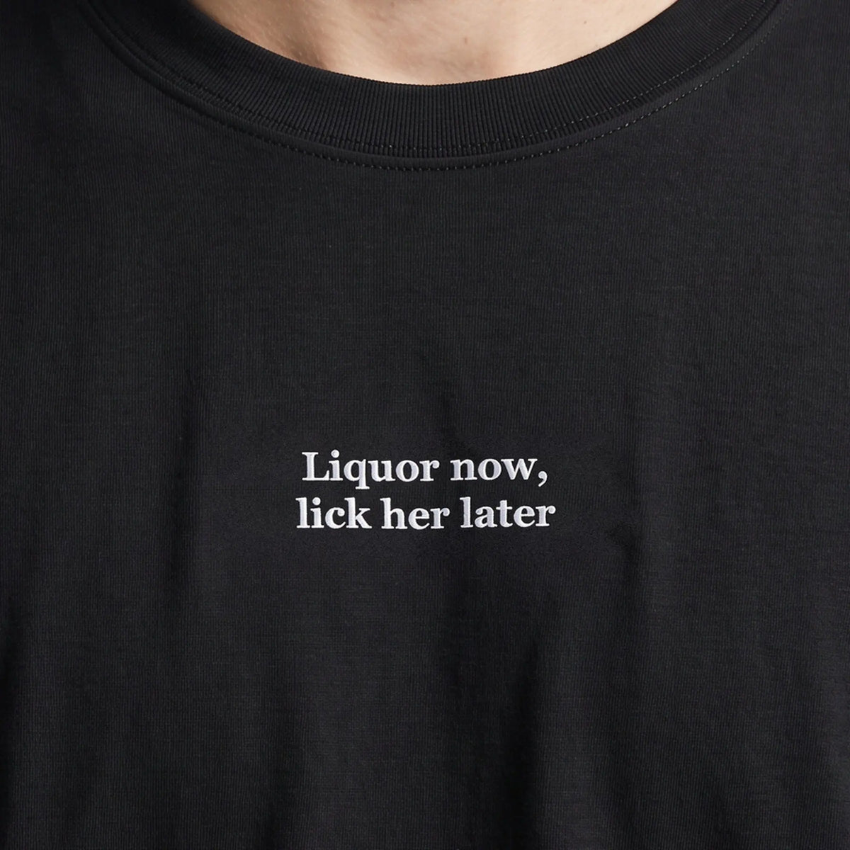 Liquor now, lick her later (embroidered) T-Shirt in Black, worn, close-up of the stitching