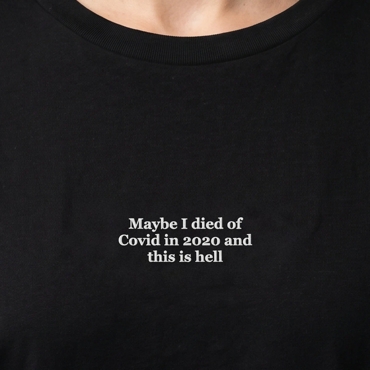 Maybe I died of Covid in 2020 and this is hell (embroidered) T-Shirt in Black, worn, close-up of the stitching