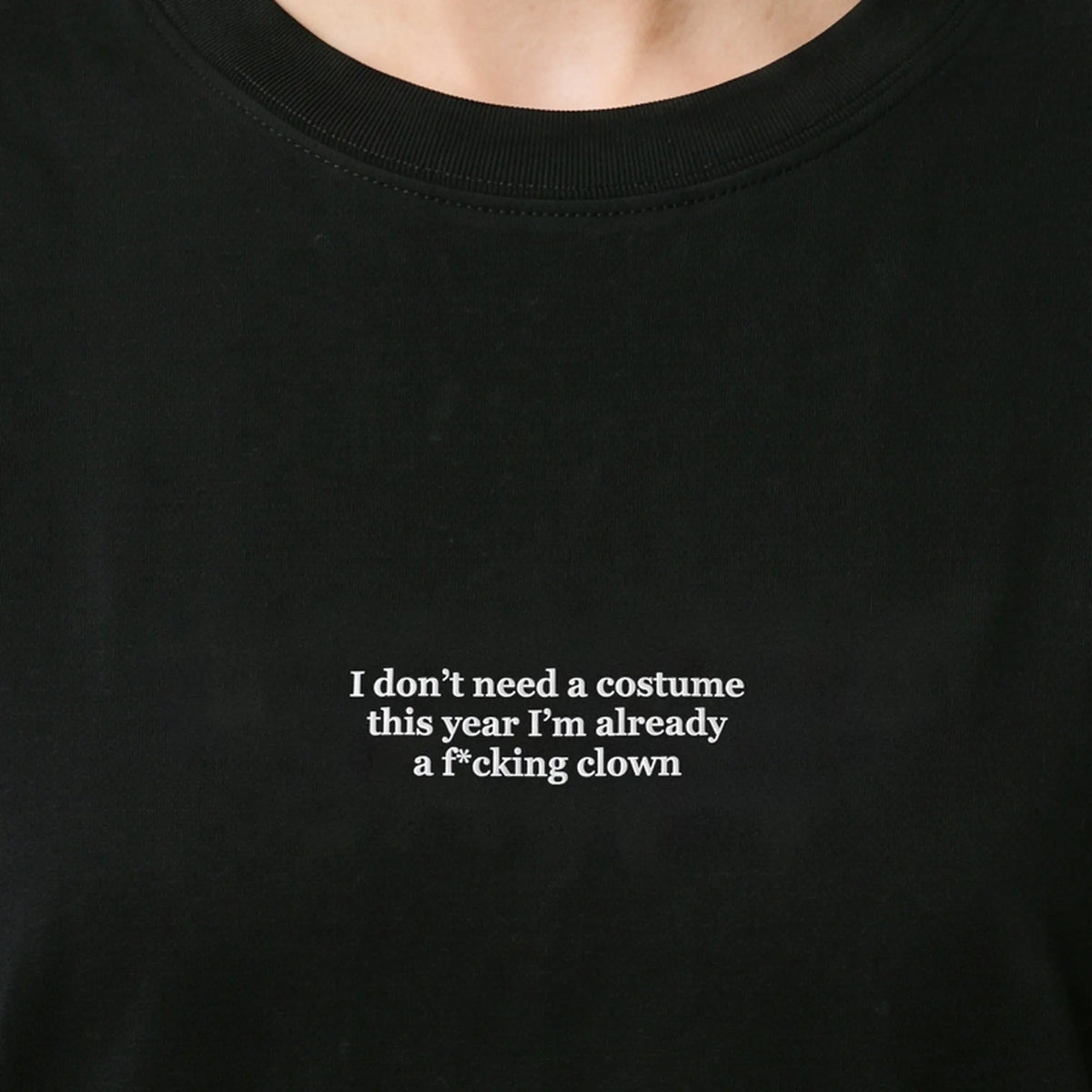 I don't need a costume this year I'm already a f*cking clown (embroidered) T-Shirt in Black, worn, close-up of the stitching