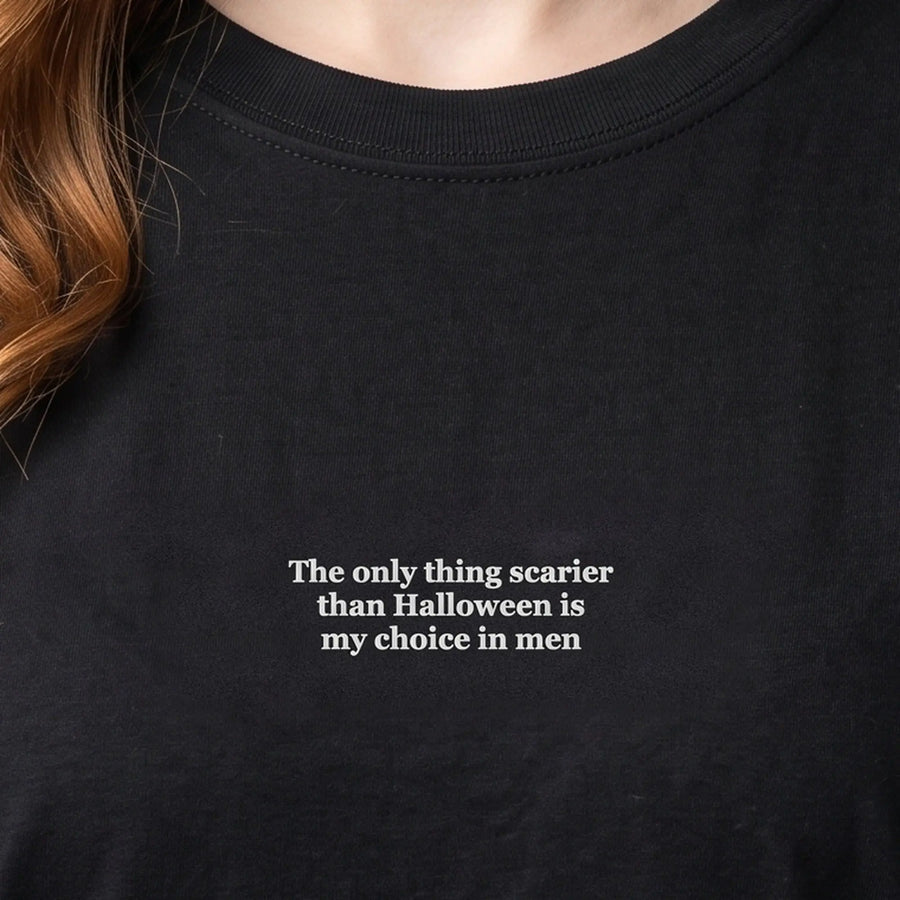 The only thing scarier than Halloween is my choice in men (embroidered) T-Shirt in Black, worn, close-up of the stitching