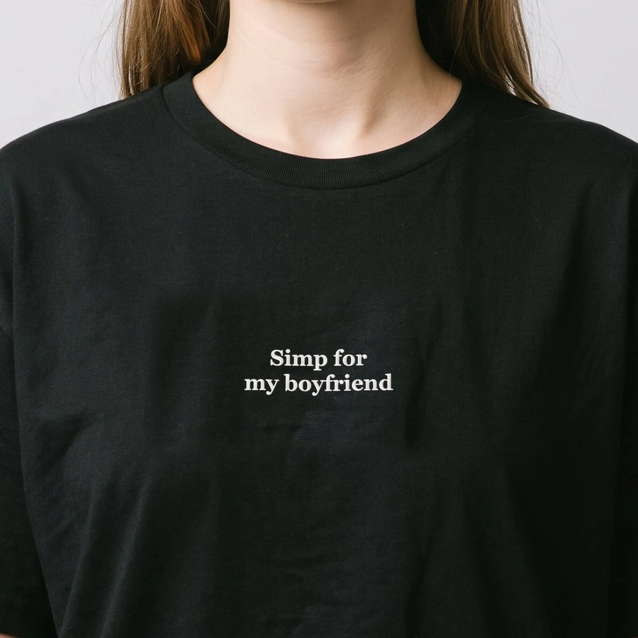 Simp for my boyfriend embroidered t-shirt in black, worn, close-up of the stitching