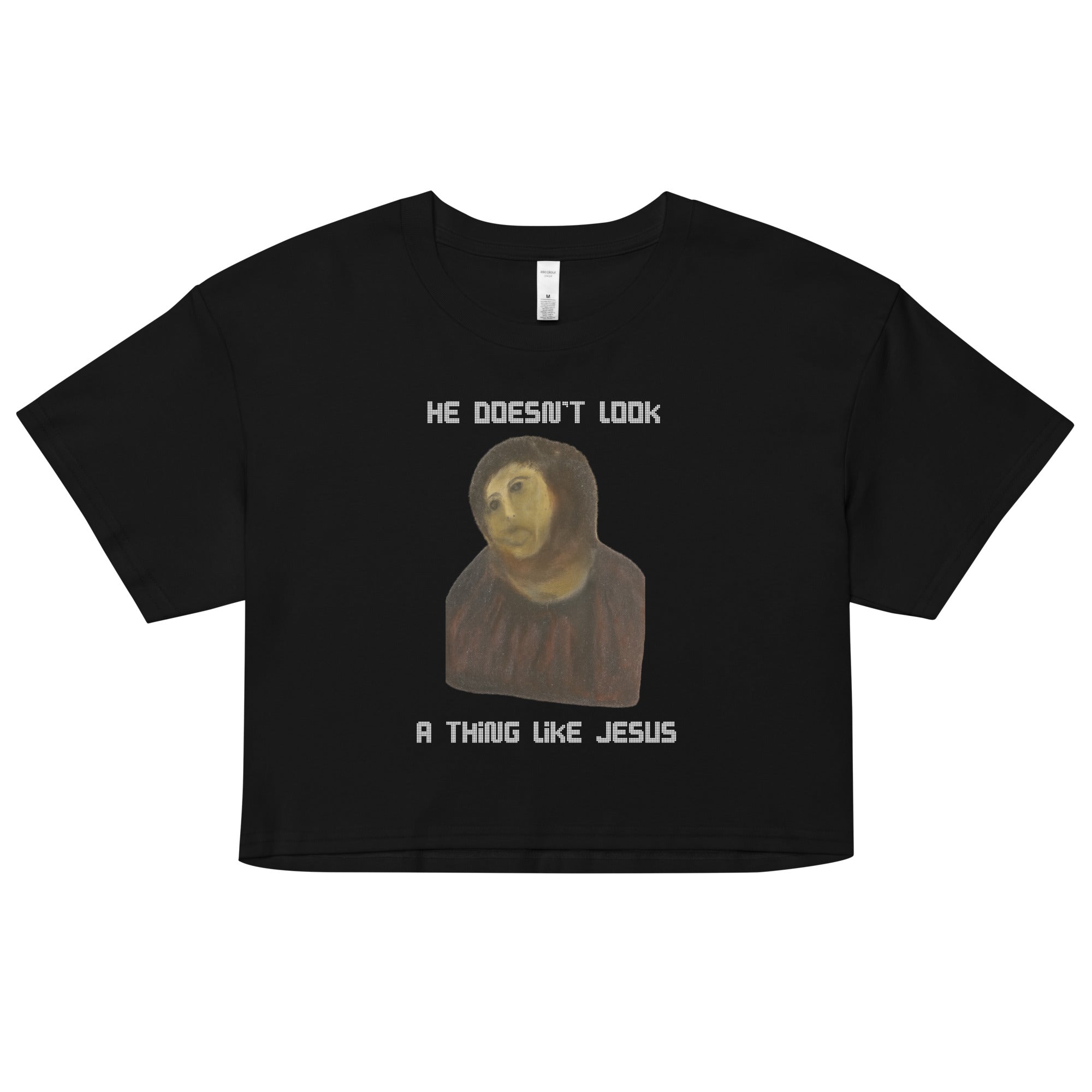 He doesn't look a thing like Jesus Women’s crop top