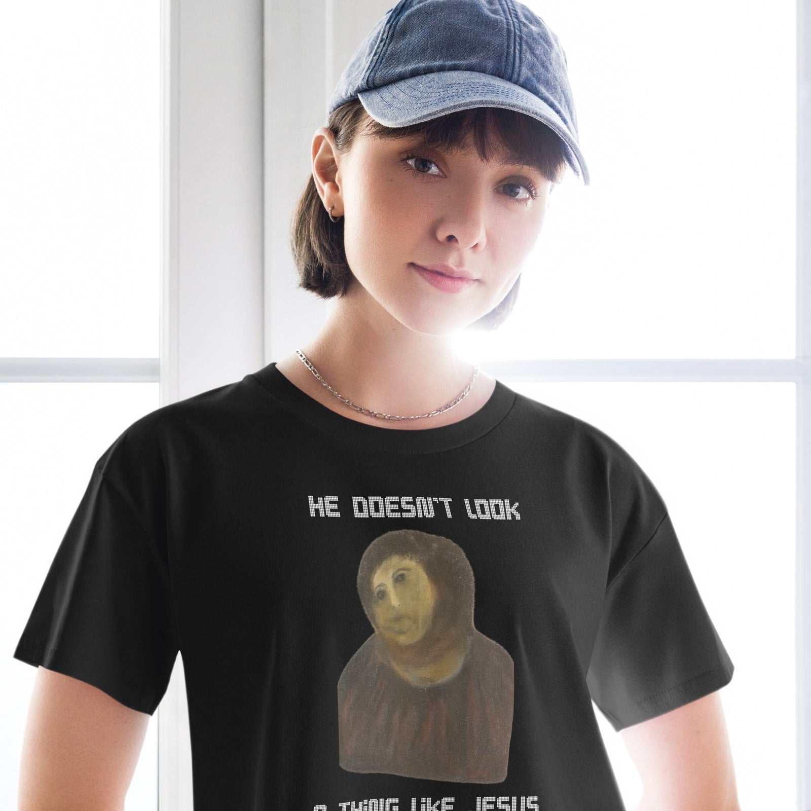 He doesn't look a thing like Jesus Women’s crop top Orbital Clothing