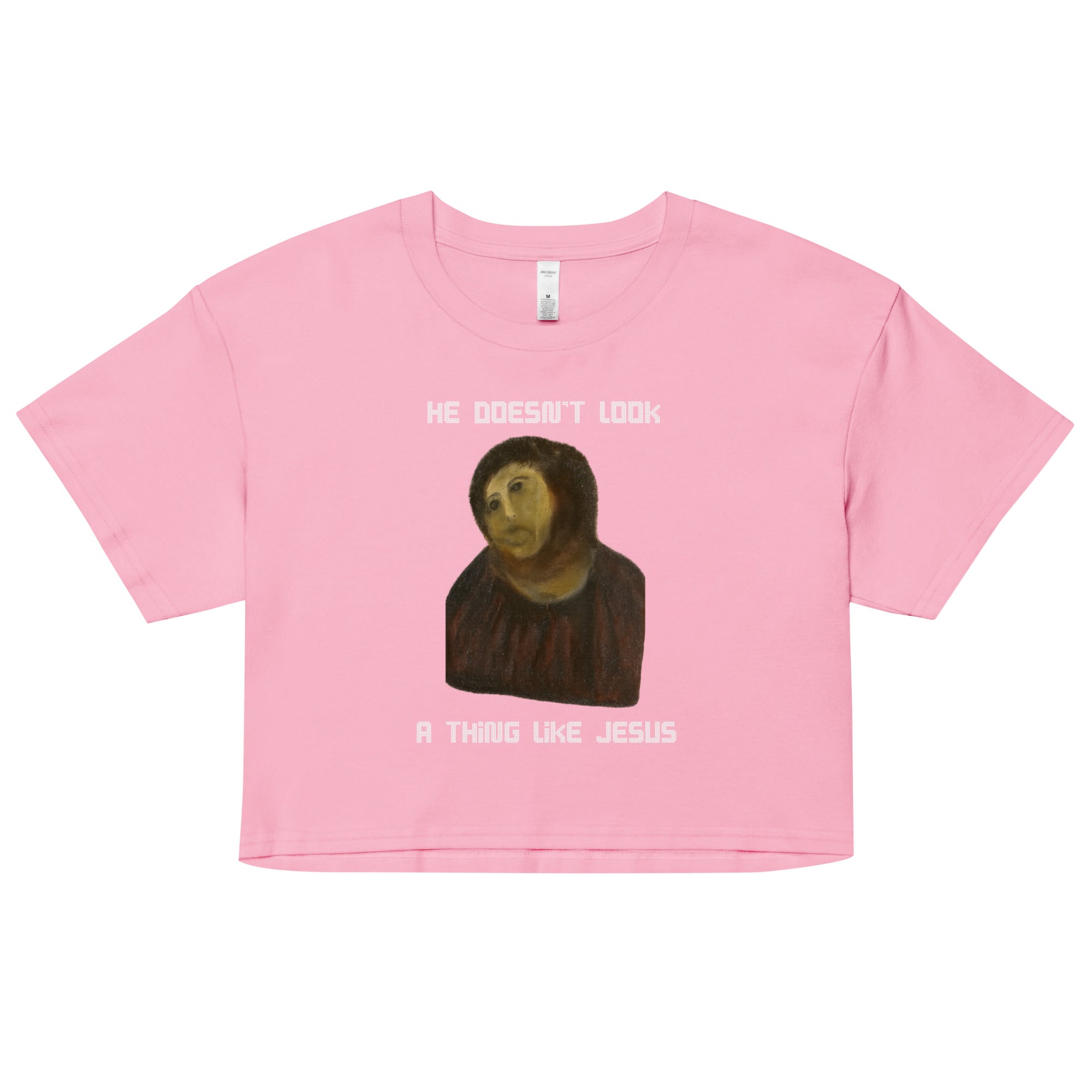 He doesn't look a thing like Jesus Women’s crop top