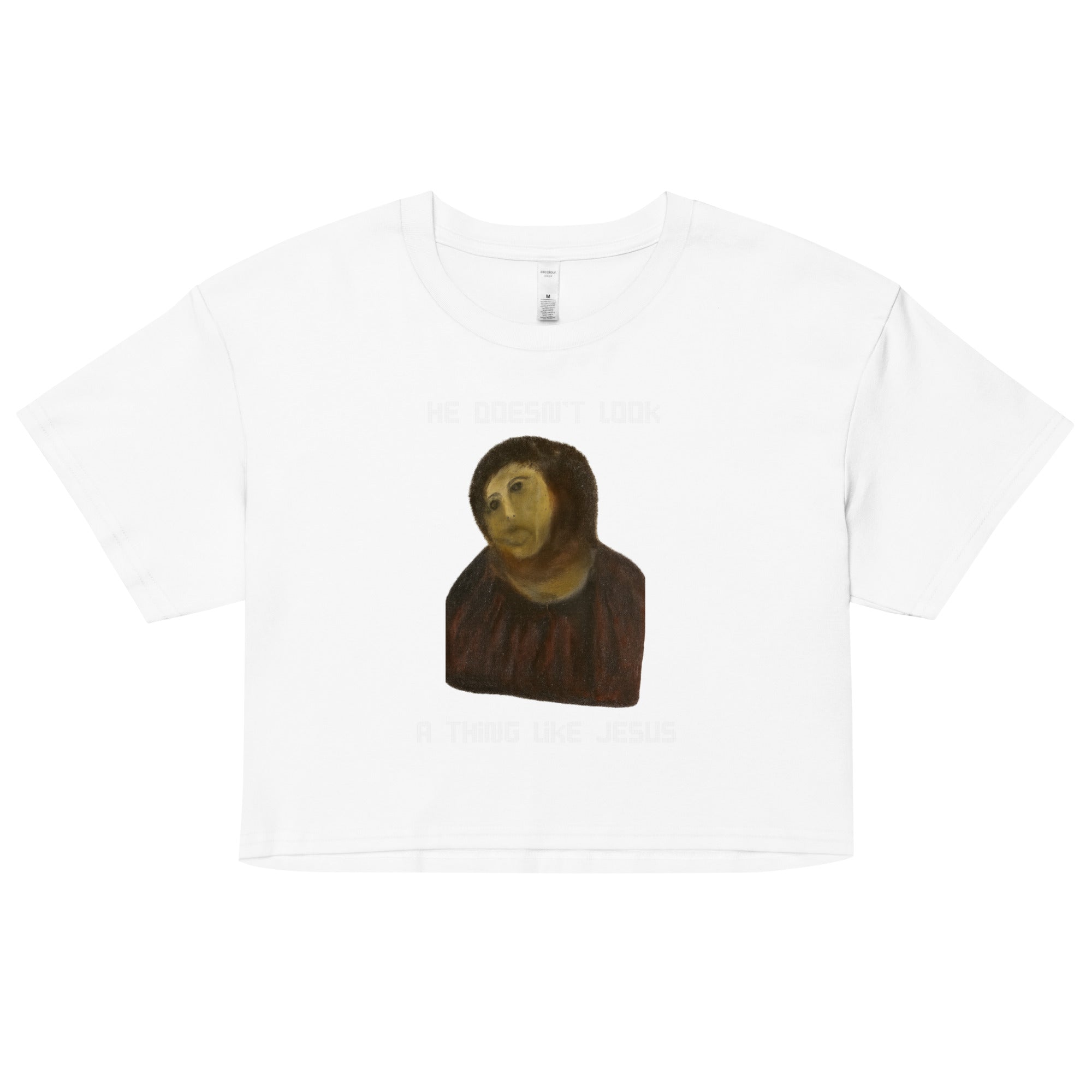 He doesn't look a thing like Jesus Women’s crop top